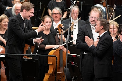 Conductor Klaus Mäkelä and composer Sauli Zinovjev in Oslo Concert Hall.
